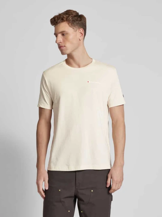 Zdjęcie produktu T-shirt z nadrukiem i naszywką z logo Champion Piaskowy
