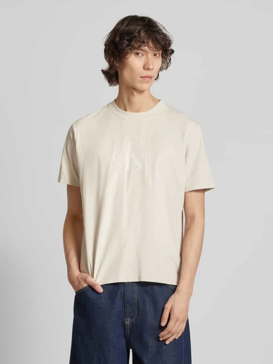 Zdjęcie produktu T-shirt z nadrukiem z logo Calvin Klein Jeans Złamany biały