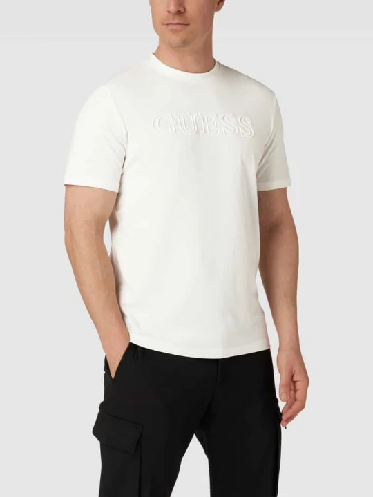 Zdjęcie produktu T-shirt z nadrukiem z logo model ‘ALPHY’ Guess Złamany biały