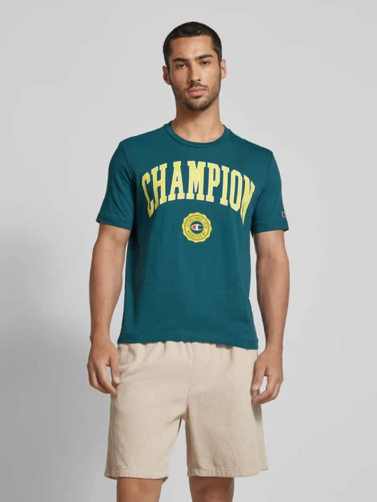 Zdjęcie produktu T-shirt z nadrukiem z logo model ‘Bookstore’ Champion Zielony