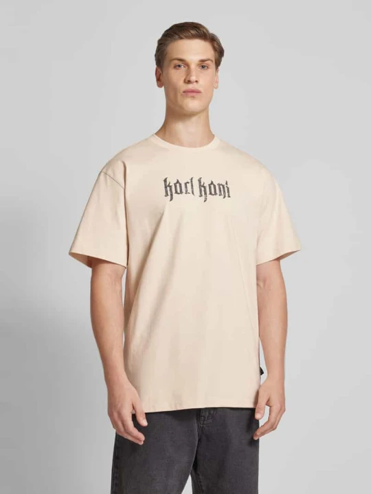 Zdjęcie produktu T-shirt z nadrukiem z logo model ‘Signature’ Karl Kani Beżowy