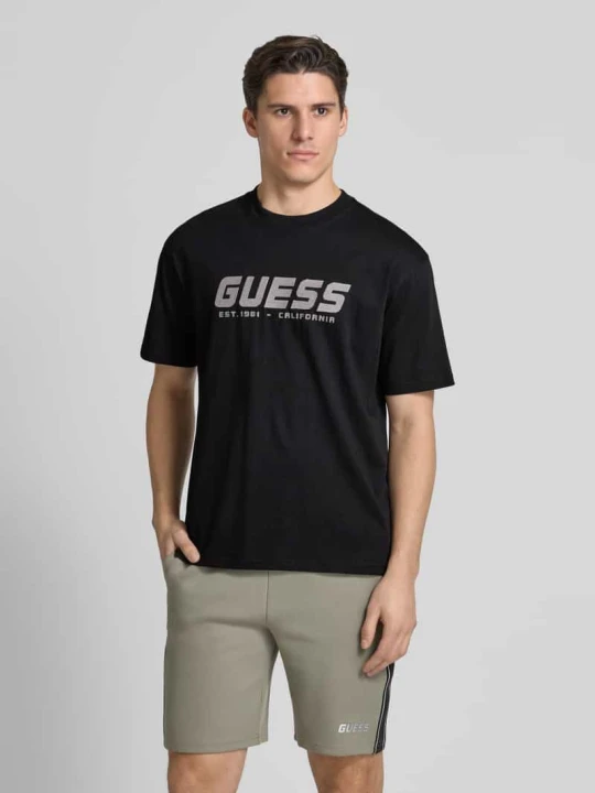 Zdjęcie produktu T-shirt z nadrukiem z logo model ‘SURON’ Guess czarny