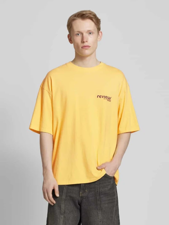 Zdjęcie produktu T-shirt z nadrukiem z logo REVIEW Pastelowy żółty