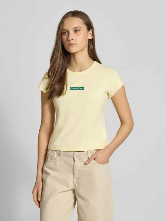 Zdjęcie produktu T-shirt z okrągłym dekoltem i nadrukiem z logo marki Calvin Klein Jeans Jasnożółty