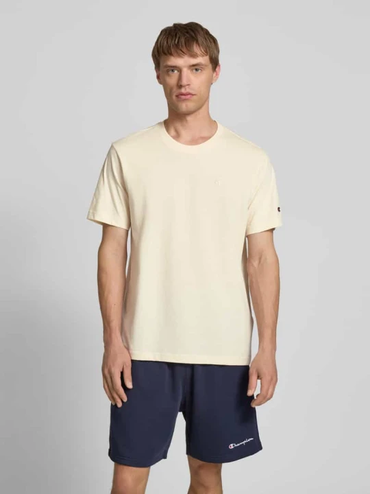 Zdjęcie produktu T-shirt z wyhaftowanym logo model ‘ICONS’ Champion Złamany biały