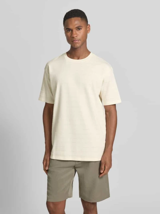 Zdjęcie produktu T-shirt ze strukturalnym wzorem i okrągłym dekoltem Scotch & Soda Złamany biały