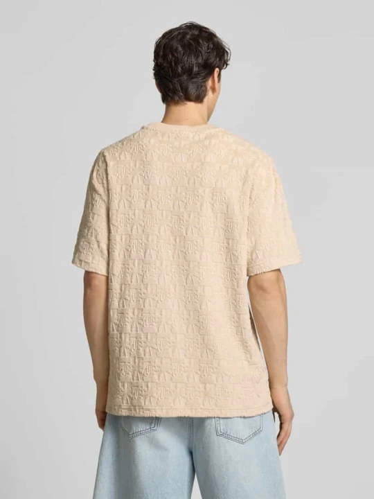 Zdjęcie produktu T-shirt ze wzorem na całej powierzchni i okrągłym dekoltem Karl Kani Piaskowy