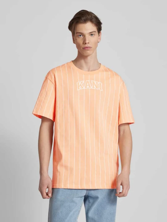 Zdjęcie produktu T-shirt ze wzorem w cienkie prążki Karl Kani Pomarańczowy