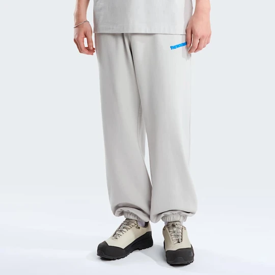 Zdjęcie produktu The North Face Męskie Luźne Joggery Z Grafiką Explore Fonts Cumulus Cloud Rozmiar male