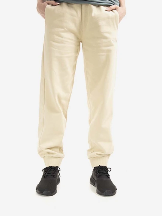 Zdjęcie produktu The North Face spodnie dresowe bawełniane Oversized Jogger