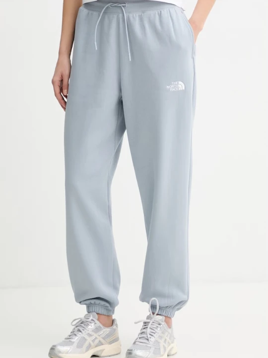 Zdjęcie produktu The North Face spodnie dresowe damskie Essential Relaxed niebieski