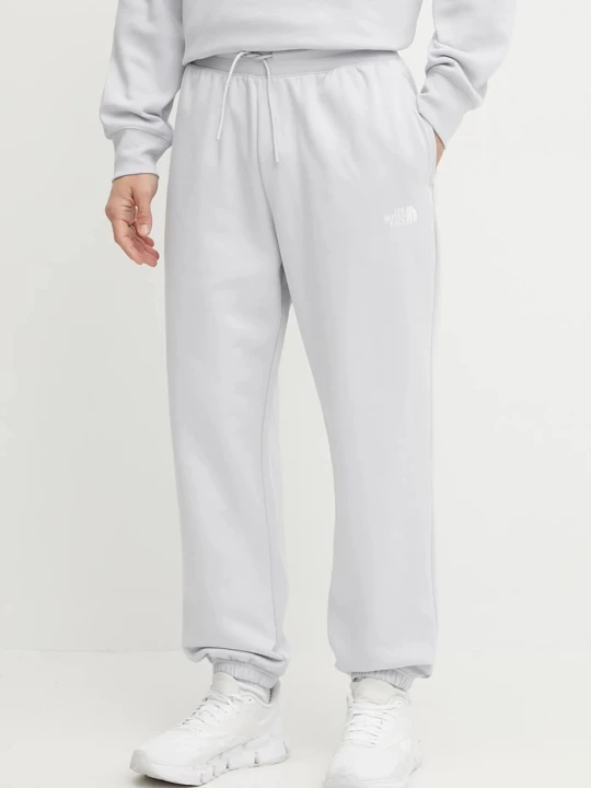 Zdjęcie produktu The North Face spodnie dresowe Essential Relaxed niebieski