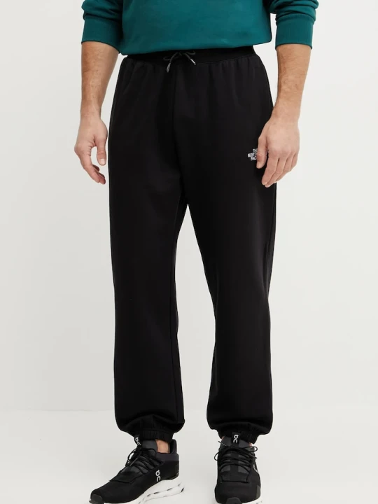 Zdjęcie produktu The North Face spodnie dresowe Essential Relaxed czarny