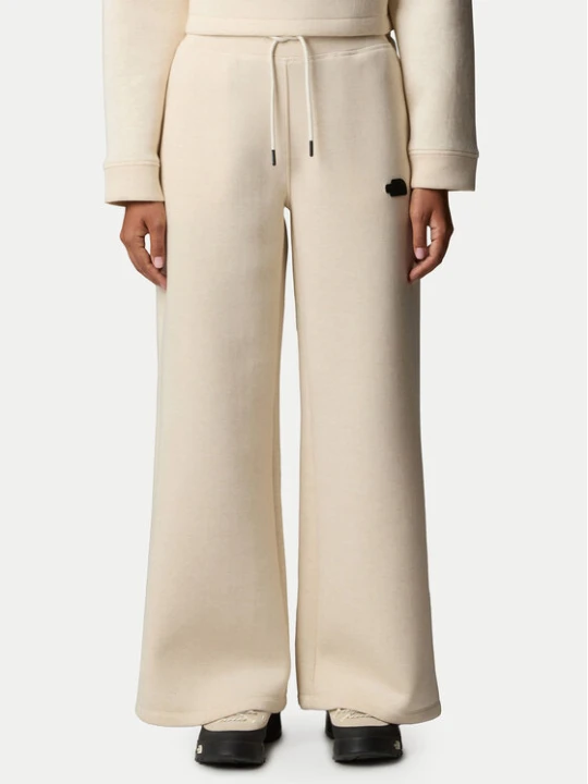 Zdjęcie produktu The North Face Spodnie dresowe NF0A8C25 Beżowy Wide Leg
