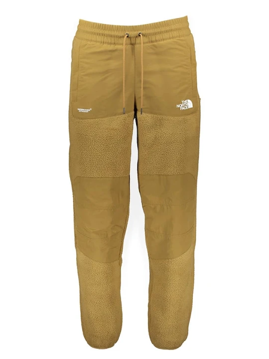 Zdjęcie produktu The North Face Spodnie polarowe "Soukuu" w kolorze żółtym rozmiar: M