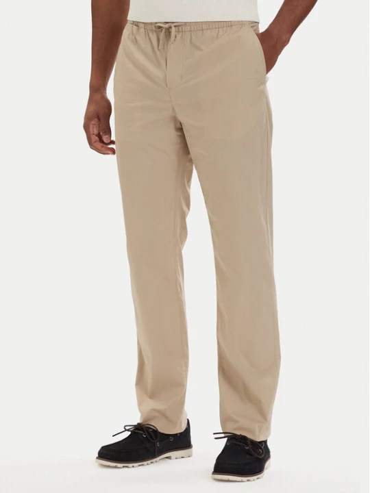 Zdjęcie produktu Tommy Hilfiger Chinosy Denton MW0MW42340 Beżowy jasny Slim Fit