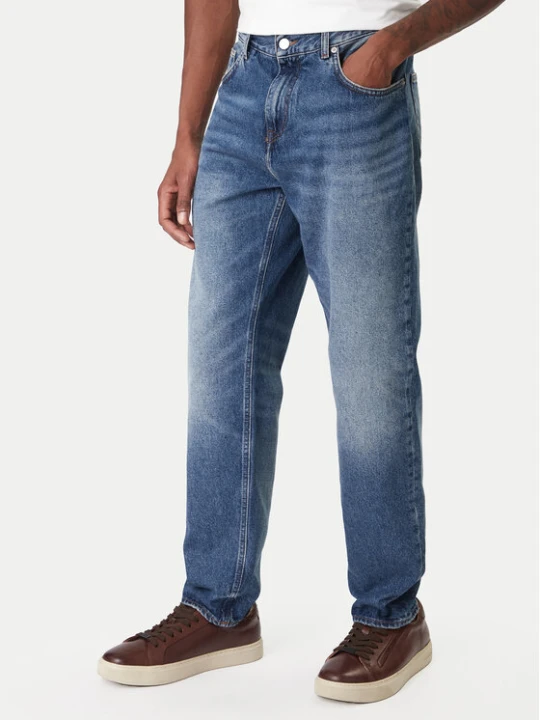 Zdjęcie produktu Tommy Hilfiger Jeansy Harlem MW0MW41890 Niebieski Tapered Fit