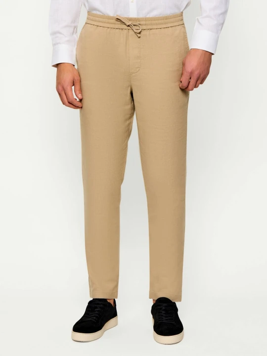 Zdjęcie produktu Tommy Hilfiger Lniane spodnie chino HARLEM | Regular Fit beżowy