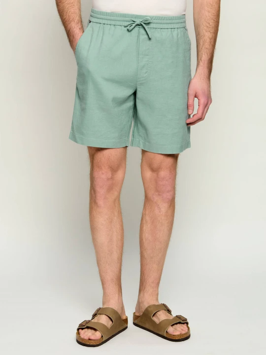 Zdjęcie produktu Tommy Hilfiger Lniane szorty chino Dover | Regular Fit zielony