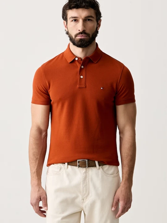 Zdjęcie produktu Tommy Hilfiger polo bawełniane z elastanem pomarańczowy