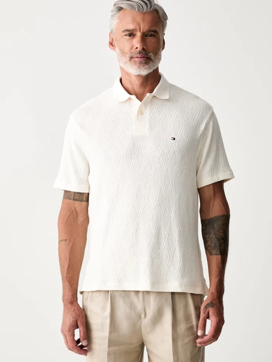 Zdjęcie produktu Tommy Hilfiger polo swetrowe męskie z lyocellem beżowy
