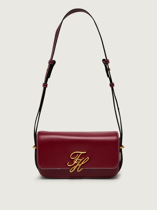 Zdjęcie produktu Tommy Hilfiger Skórzana torebka na ramię Script bordowy