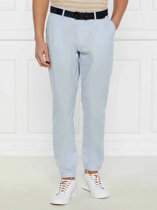 Zdjęcie produktu Tommy Hilfiger Spodnie chino HARLEM | Relaxed fit niebieski
