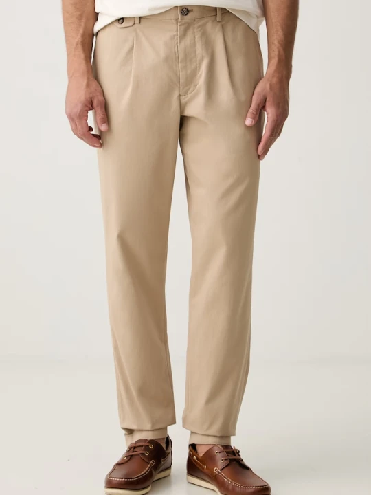 Zdjęcie produktu Tommy Hilfiger spodnie chinos męskie z bawełną beżowy