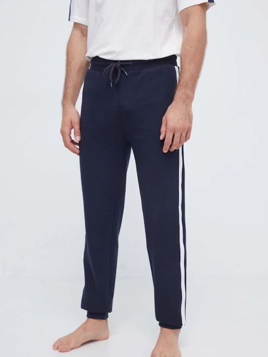 Zdjęcie produktu Tommy Hilfiger spodnie dresowe bawełniane granatowy