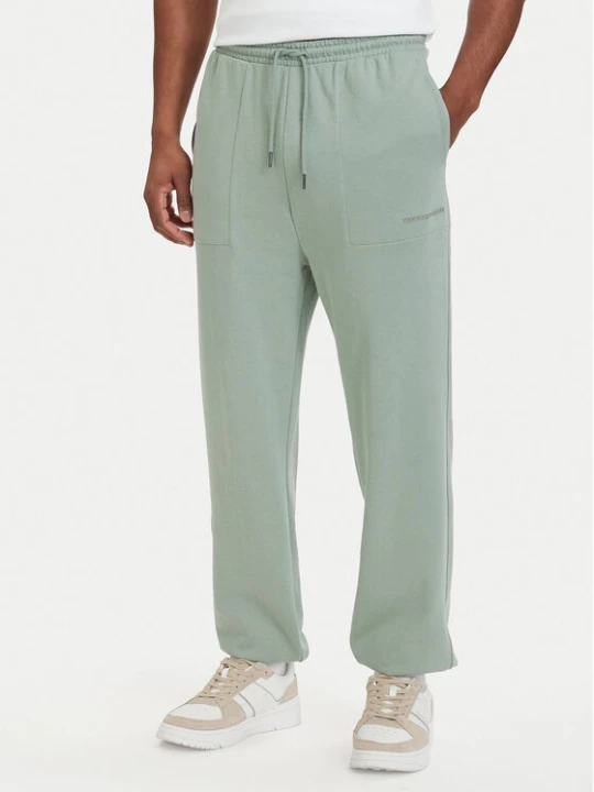Zdjęcie produktu Tommy Hilfiger Spodnie dresowe Essential UM0UM03911 Zielony jasny Relaxed Fit