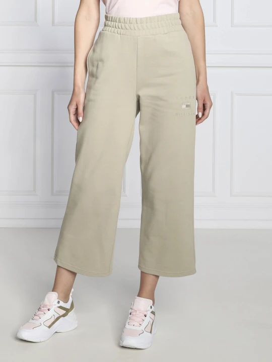 Zdjęcie produktu Tommy Hilfiger Spodnie dresowe | flare fit beżowy