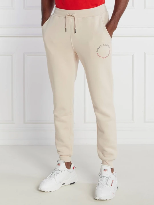 Zdjęcie produktu Tommy Hilfiger Spodnie dresowe MONOTYPE ROUNDALL | Regular Fit beżowy