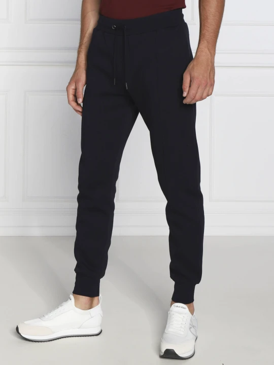 Zdjęcie produktu Tommy Hilfiger Spodnie dresowe | Regular Fit granatowy