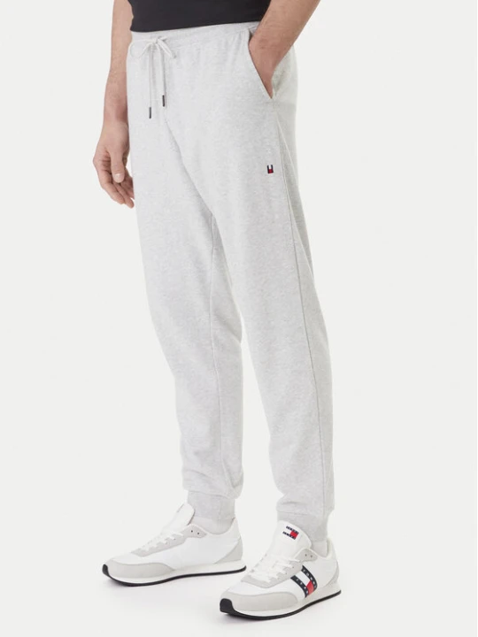 Zdjęcie produktu Tommy Hilfiger Spodnie dresowe UM0UM03664 Szary Regular Fit