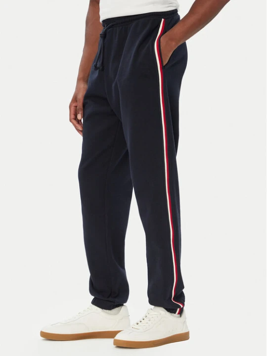 Zdjęcie produktu Tommy Hilfiger Spodnie dresowe UM0UM03944 Granatowy Regular Fit