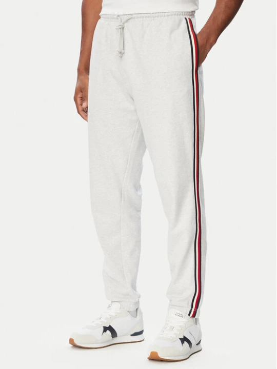 Zdjęcie produktu Tommy Hilfiger Spodnie dresowe UM0UM03944 Szary jasny Regular Fit