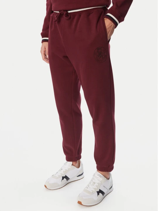 Zdjęcie produktu Tommy Hilfiger Spodnie dresowe UM0UM04059 Bordowy Regular Fit