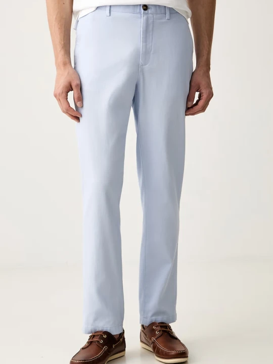 Zdjęcie produktu Tommy Hilfiger spodnie slim fit męskie bawełniane z elastanem niebieski