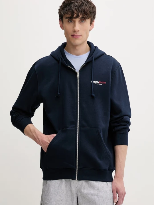 Zdjęcie produktu Tommy Jeans bluza rozpinana z kapturem męska z bawełną granatowy