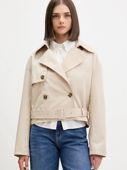 Zdjęcie produktu Tommy Jeans krótki trencz damski z bawełną beżowy
