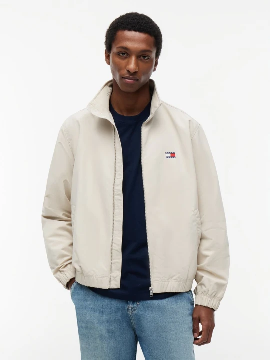 Zdjęcie produktu Tommy Jeans kurtka przejściowa Mężczyźni beżowy