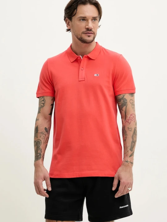 Zdjęcie produktu Tommy Jeans polo męskie bawełniane pomarańczowy