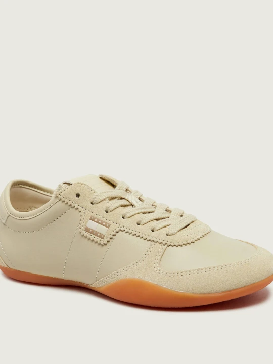 Zdjęcie produktu Tommy Jeans Skórzane sneakersy | zamsz beżowy
