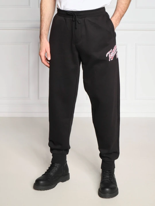 Zdjęcie produktu Tommy Jeans Spodnie dresowe COLLEGE 85 | Regular Fit czarny