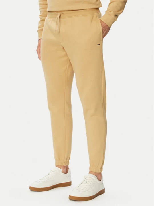 Zdjęcie produktu Tommy Jeans Spodnie dresowe Flag DM0DM20473 Beżowy Slim Fit