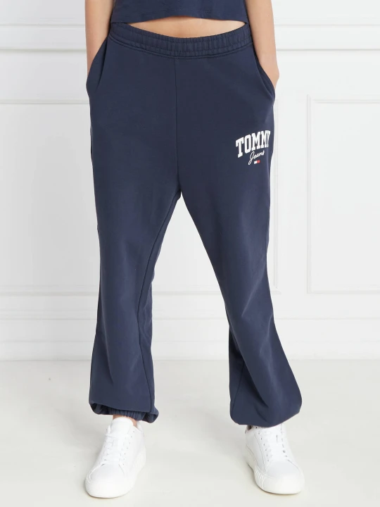 Zdjęcie produktu Tommy Jeans Spodnie dresowe | flare fit granatowy
