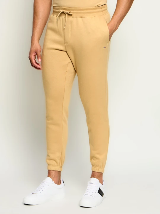 Zdjęcie produktu Tommy Jeans Spodnie dresowe | Slim Fit beżowy
