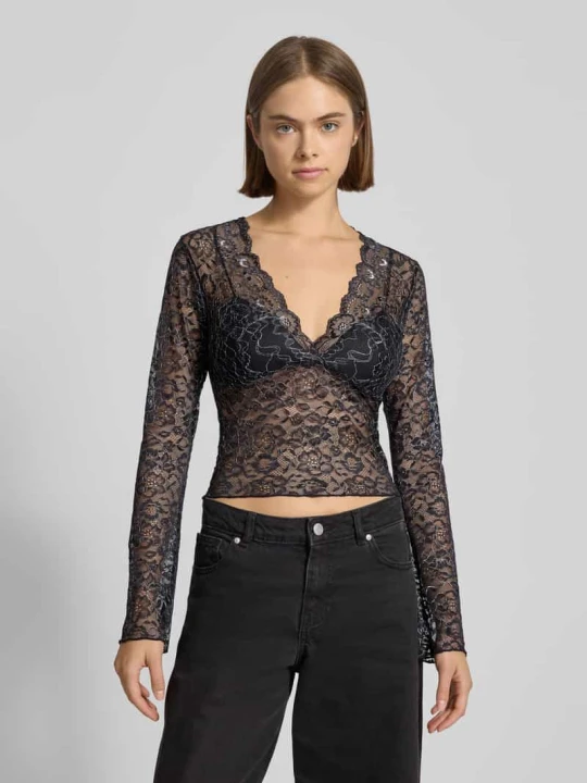 Zdjęcie produktu Top bluzkowy o kroju regular fit ze wzorem z efektowną przędzą model ‘CHLOE’ Only Czarny