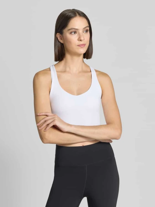 Zdjęcie produktu Top o kroju krótkim z wbudowanymi miseczkami Fabletics Biały