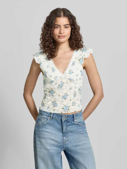 Zdjęcie produktu Top o kroju slim fit z głębokim dekoltem w serek model 'SAGA' Only Złamany biały